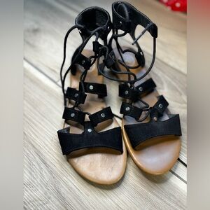Woman’s black gladiator style sandles 7.5